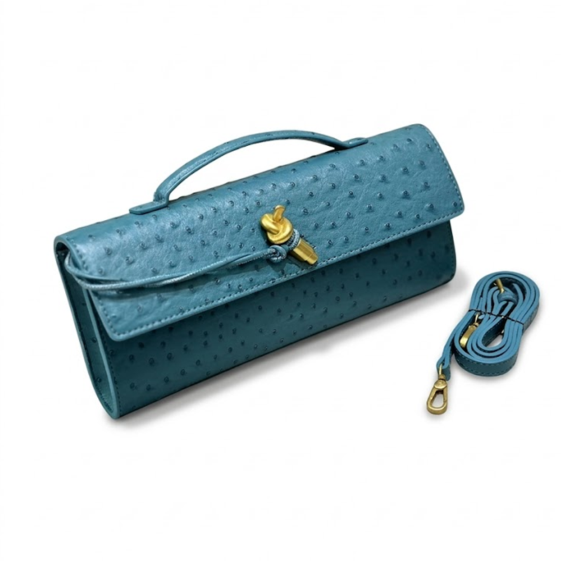 THE KNOT FLAP CLUTCH - Ostrich Embossed detail image 11