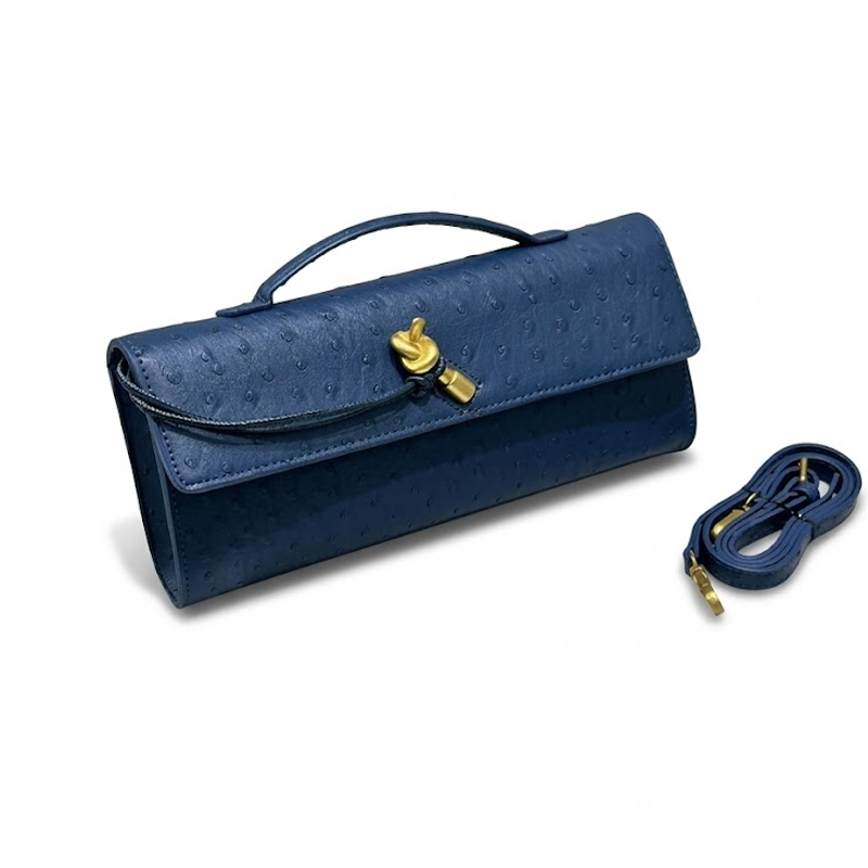 THE KNOT FLAP CLUTCH - Ostrich Embossed detail image 15