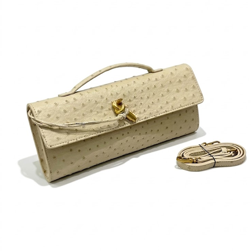 THE KNOT FLAP CLUTCH - Ostrich Embossed detail image 9