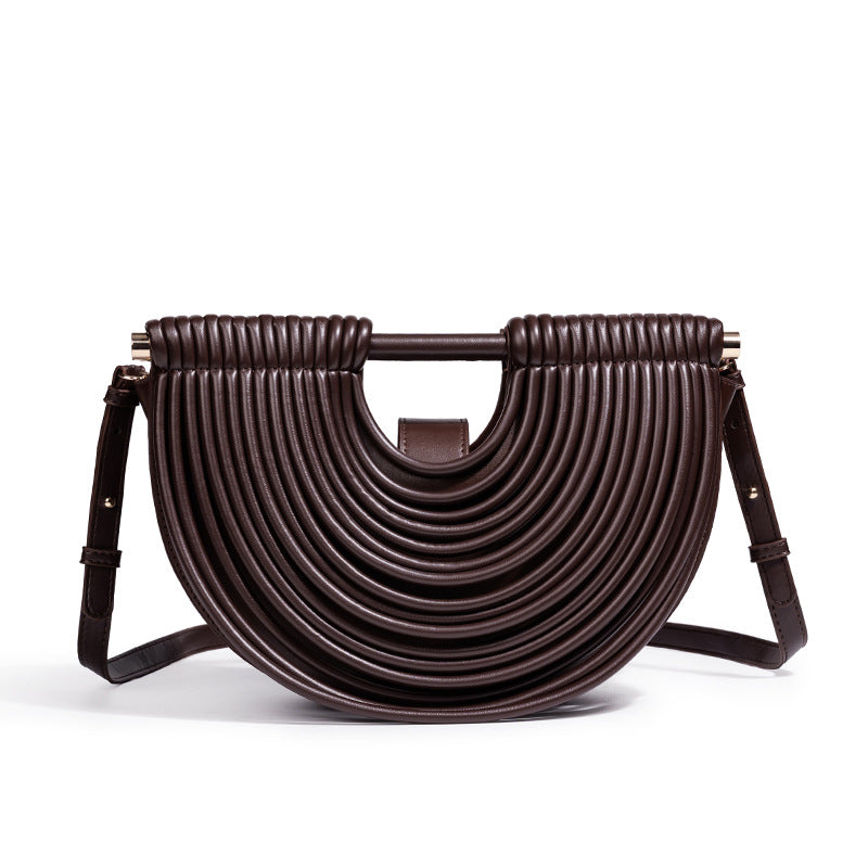 THE RADIAL PLEAT ARCHITECTURAL CLUTCH detail image 11