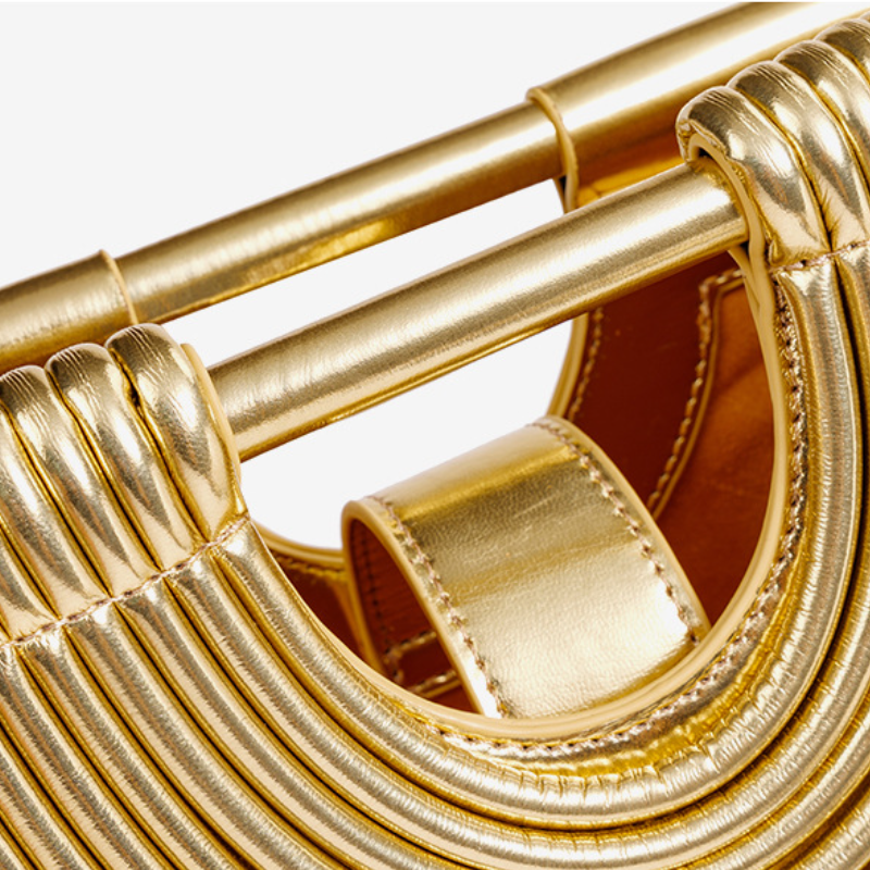 THE RADIAL PLEAT ARCHITECTURAL CLUTCH detail image 12