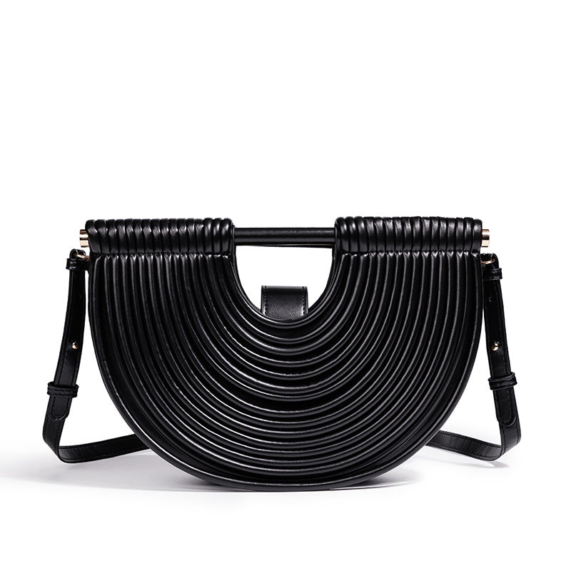 THE RADIAL PLEAT ARCHITECTURAL CLUTCH detail image 6